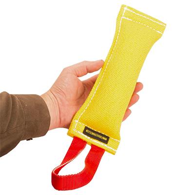 Dog bite training tug with soft synthetic stuffing